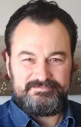 Алпер Дюзен